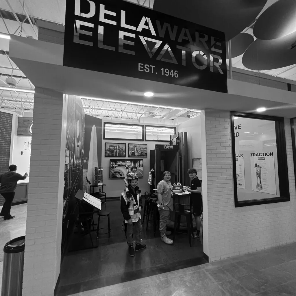 a black and white photo of a store entrance
