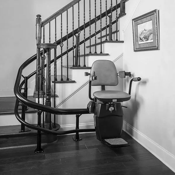 a black and white photo of a stair case