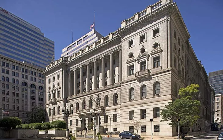 a large building with a flag on top of it